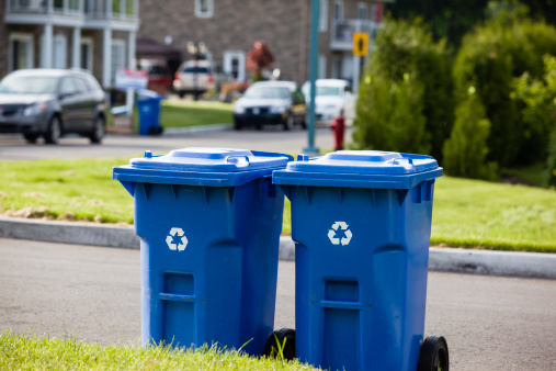 Recycle bin in front of the street