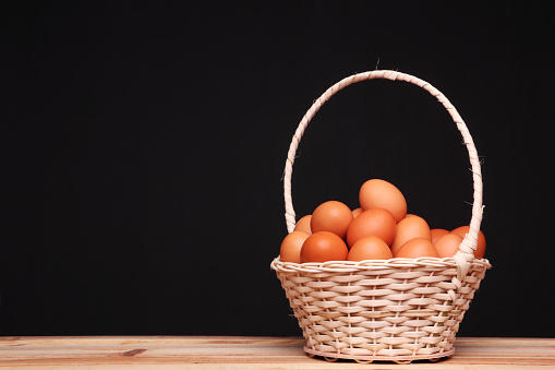 Eggs in a wicker basket.  Concept:  