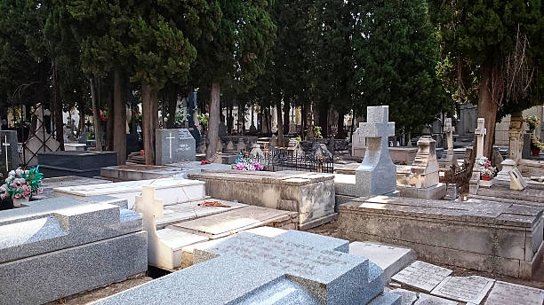 CIPRESES SEA AND CROSSES IN A ROMANTIC CEMETERY