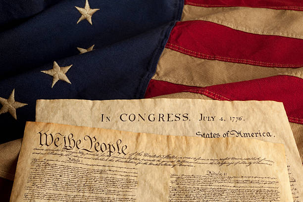 istock Constitution and Declaration of Independence on Grungy Betsy Ross Flag 482675379