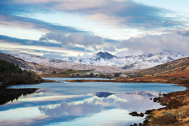 Snowdonia mountains Wales, Snowdon, 11 May, 2015 : Snowy Snowdonia mountains in winter . snowdonia national park photos stock pictures, royalty-free photos & images