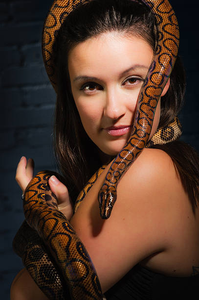 istock Woman and snake 482677595