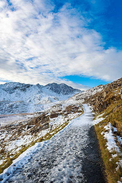 Snowdonia mountains Wales, Snowdon, 11 May, 2015 : Snowy Snowdonia mountains in winter . snowdonia stock pictures, royalty-free photos & images