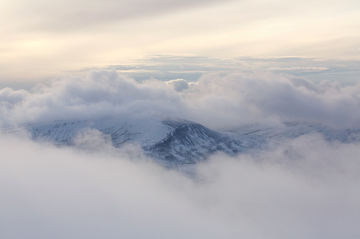 Cloudscape over Mountain with Snow. Copy Space.