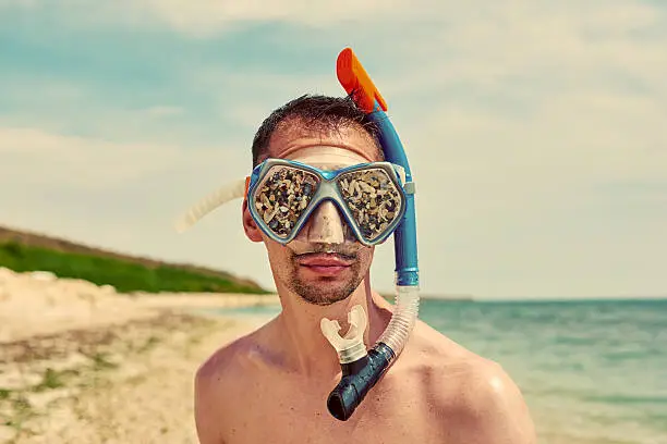 Photo of sandy swimming goggles