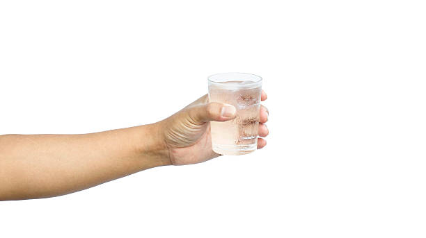 istock Hand holding a glass of water 482679752