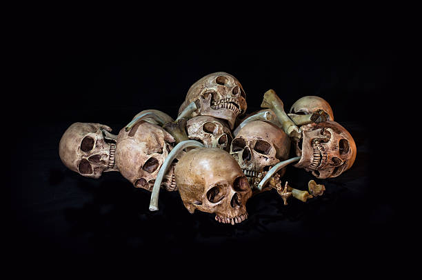 istock Awesome, pile of skull and bone, on black background, 482679956