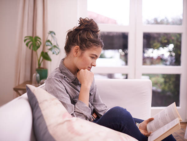 istock Reading is her favourite past-time 482680218
