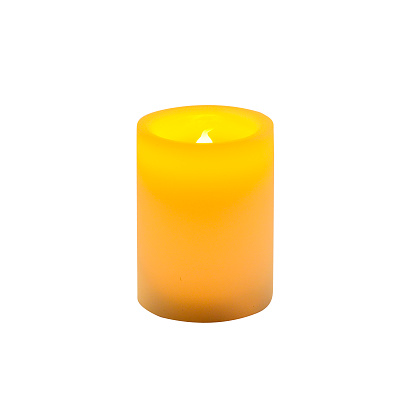 Flameless pillar candle isolated on white background
