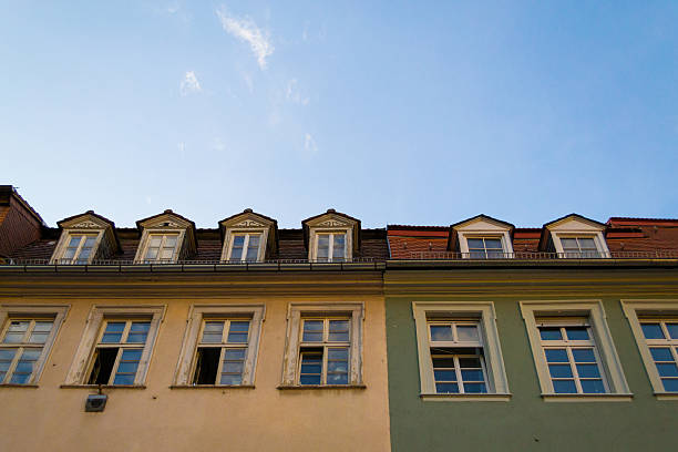 istock green and yellow houses 482681804
