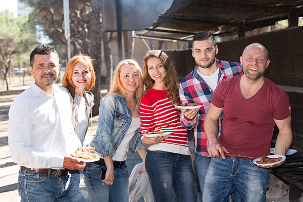 istock Friends taking pictures together at barbecue 482681906