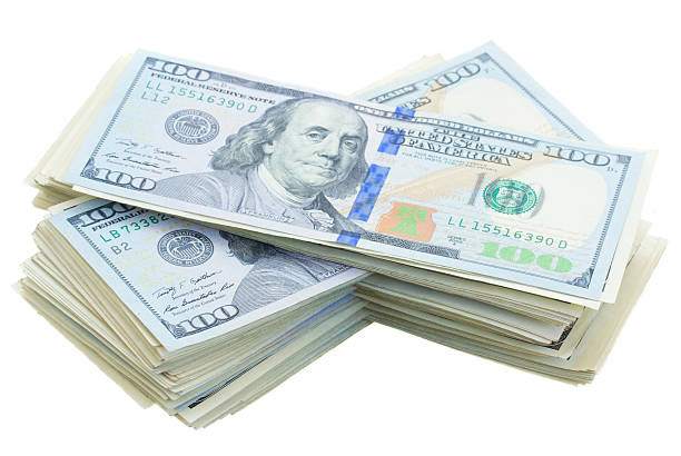 istock thre piles of dollars money 482685480