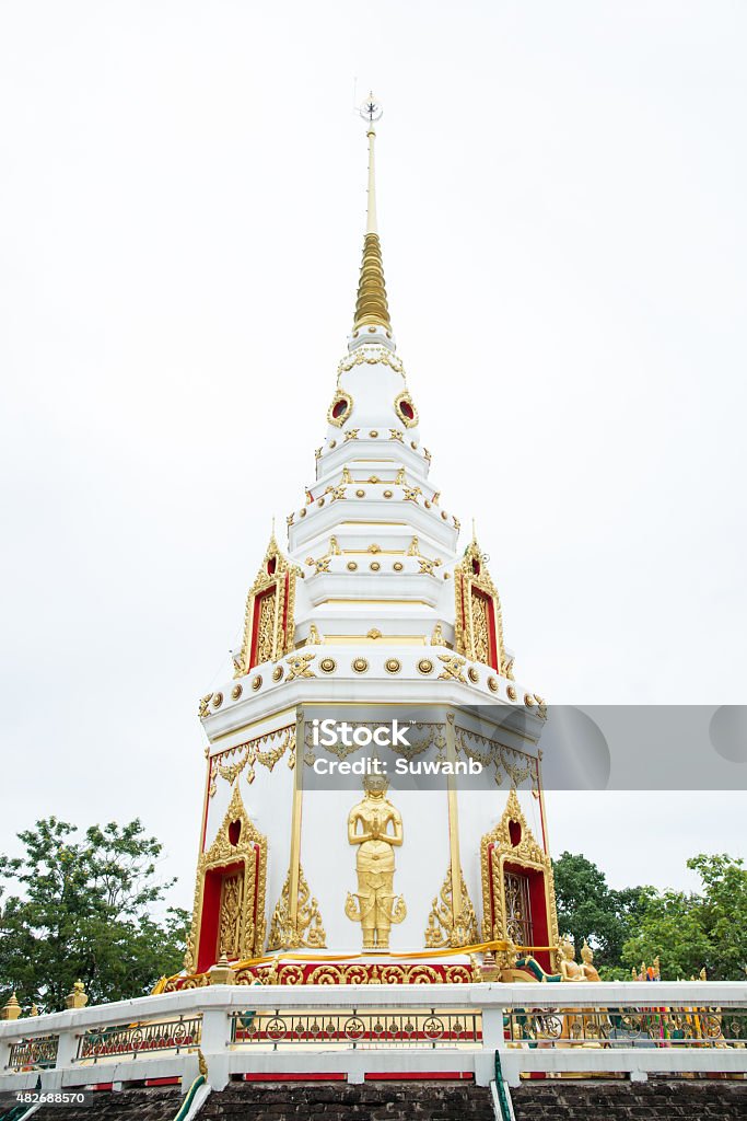 White pagoda and golden buddha. 2015 Stock Photo