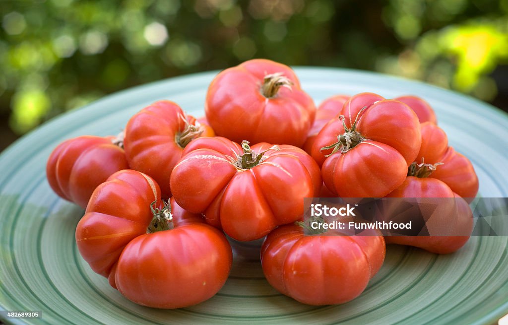 Fundo de produtos orgânicos produzidos localmente, tomate Heirloom & Legumes fresquinhos Garden - Foto de stock de Abundância royalty-free