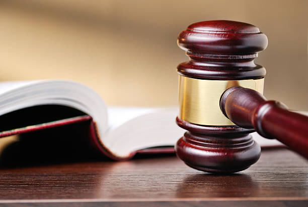 istock Judges wooden gavel and law book 482689639