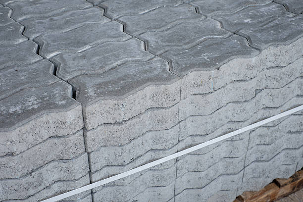 istock Pile of cement brick block 482690200