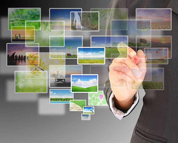 istock Young woman pointing multimedia screen with a pen. 482691831