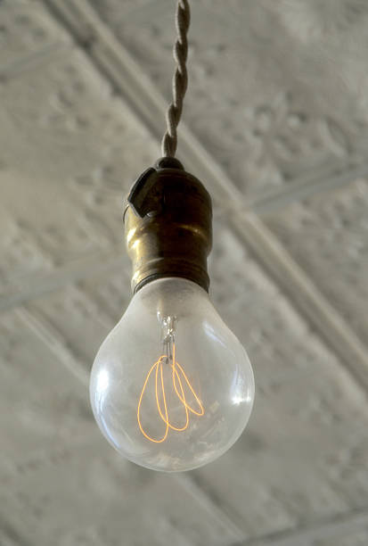 istock Glowing light bulb at Bodie the ghost town with ceiling 482693171