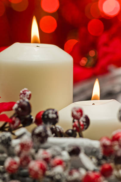 istock White candles in autumn winter decoration 482693796