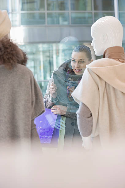 istock Young woman window shopping 482694149