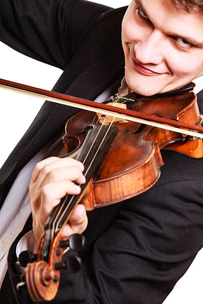 istock Man violinist playing violin. Classical music art 482694529