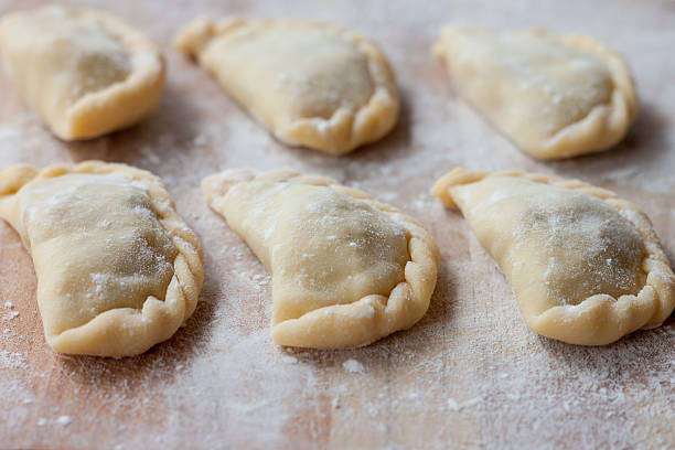 istock Uncooked dumplings with potatoes and mushrooms 482696141