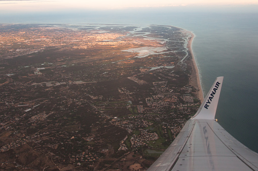 Faro, Portugal - 13 June, 2015: Ryanair Airplane take-off at Faro Airport.