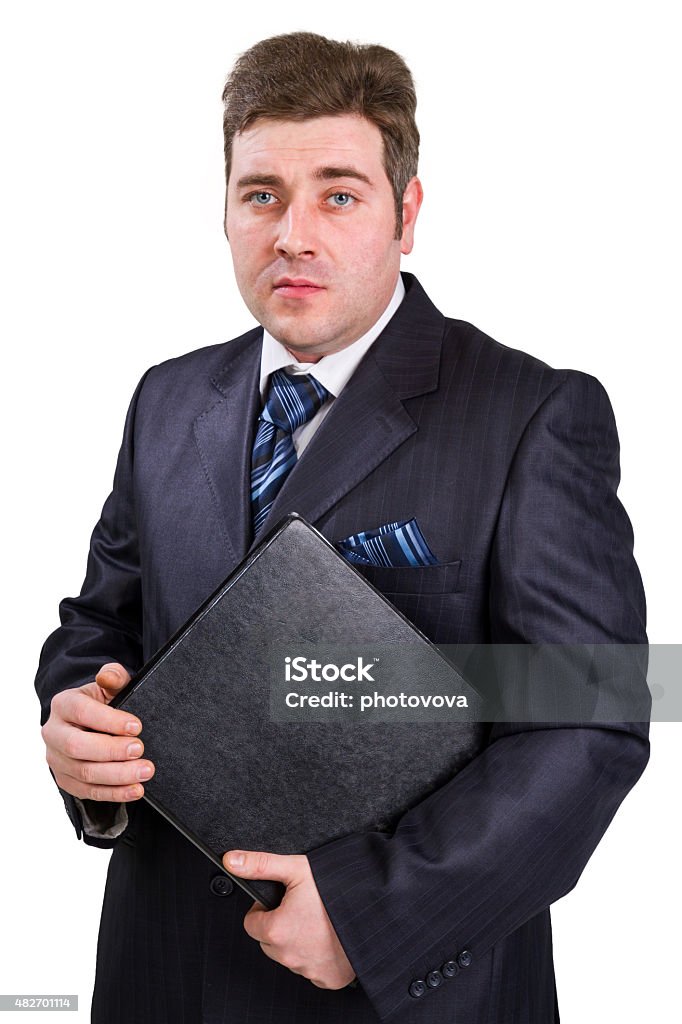 businessman with folder Portrait of happy smiling businessman with folder, isolated on white background 2015 Stock Photo