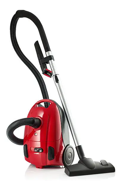 Photo of Red Vacuum Cleaner isolated on white background