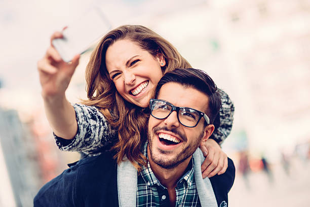 istock Happy couple making selfie outdoors 482705570