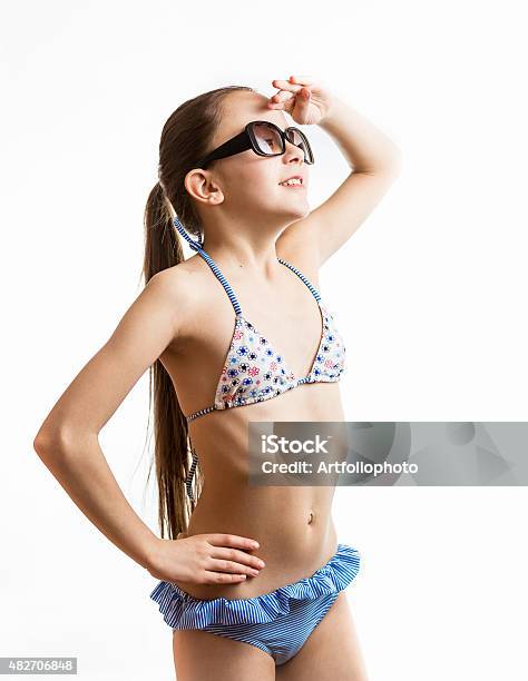 Happy Young Teenage Girl Swimsuit Stands Barefoot Splashing Water