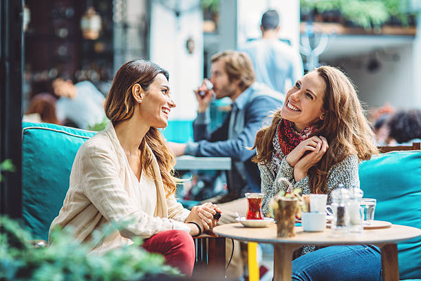 istock Young women drinking tea and coffee 482707270