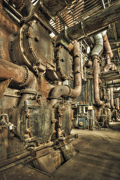 istock Decaying boiler room in an abandoned power plant 482707448