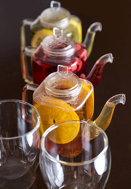 istock three square teapots with different fruit tastes of tea 482708157