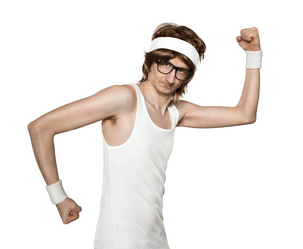 Funny retro sports nerd Funny retro nerd flexing muscle isolated on white background nerd stock pictures, royalty-free photos & images