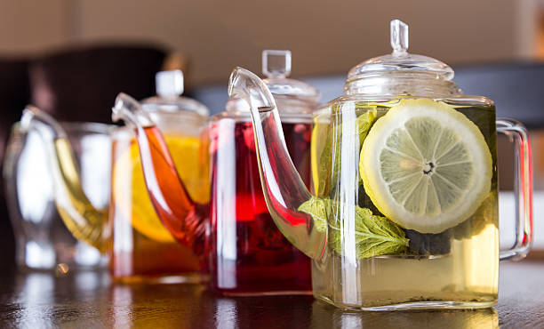 istock three square teapots with different fruit tastes of tea 482708671
