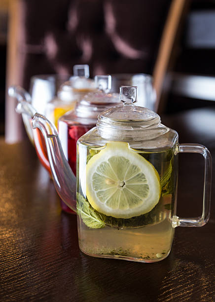 istock three square teapots with different fruit tastes of tea 482708699