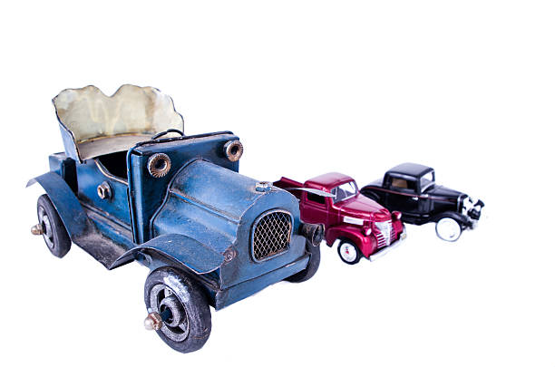 istock vintage toy cars in white background 482709577