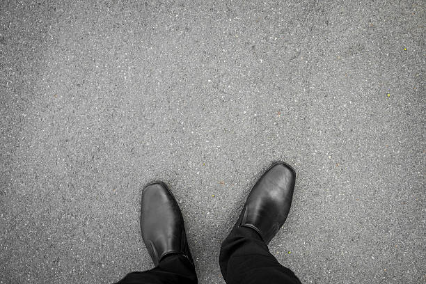 istock Black shoes standing on the floor 482710726