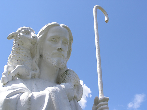 A statue of Jesus Christ, the Good Shepherd, in a local Nova Scotia cemetery.