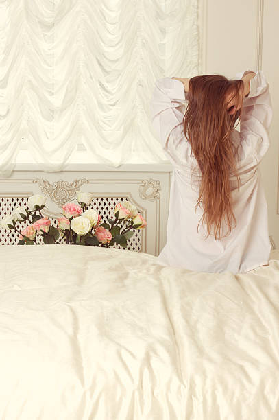 istock Girl sitting on the bed 482713769