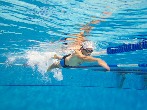 schwimmer - internationales sportereignis stock-fotos und bilder