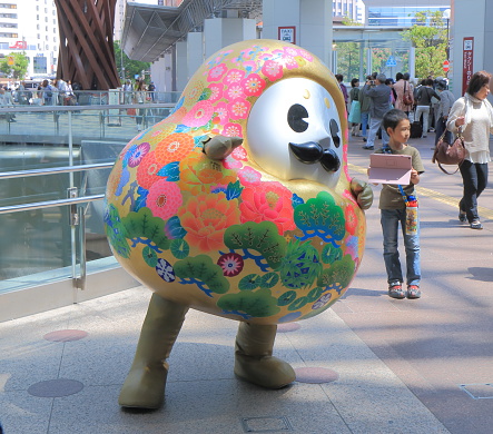 Kanazawa Japan - May 10, 2015: Kanazawa city mascot character poses for photos shoot at Kanazawa station in Kanazawa Japan.