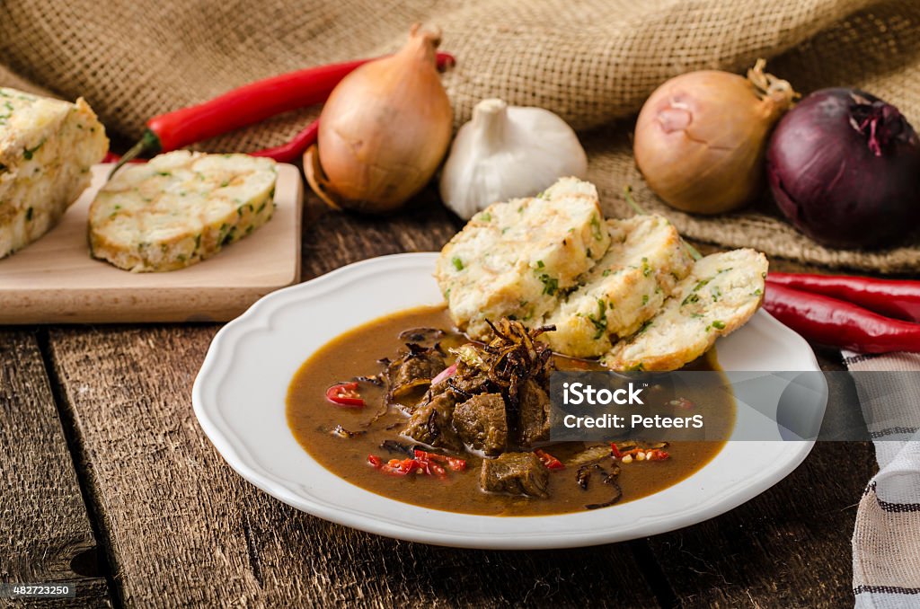 Classic Czech goulash with dumplings Classic Czech goulash with dumplings, delicious heavy food, homemade Karlovarsky dumplings Food Stock Photo