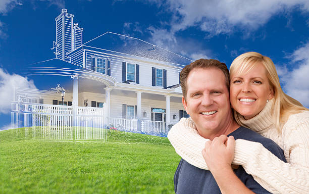 istock Hugging Couple with Ghosted House Drawing Behind 482724180