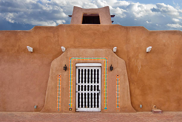 istock Adobe Clay Wall with Carved Door, Santa Fe Style 482725071