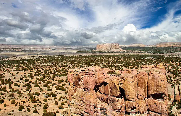 Enchanted Mesa is a sandstone butte in Cibola County, New Mexico, United States, about 2.5 miles northeast of the pueblo of Acoma. Acoma tradition says that Enchanted Mesa was the home of the Acoma people until a severe storm and landslide destroyed the only approach.