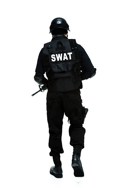 istock Rear view of swat walking 482726141