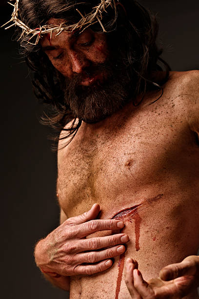istock Jesus Christ looking at wounds 482726153