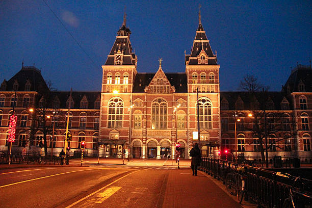 Amsterdam, Holland - January 4, 2014: The Rijksmuseum all lit up as dawn breaks over Amsterdam.